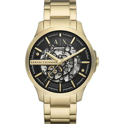 Goldene Armani Exchange Herrenuhr am Handgelenk, mit schwarzem Zifferblatt und skelettiertem Design
